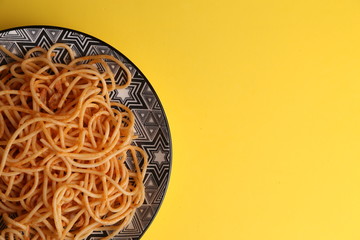 plate of spaghetti pasta with tomato