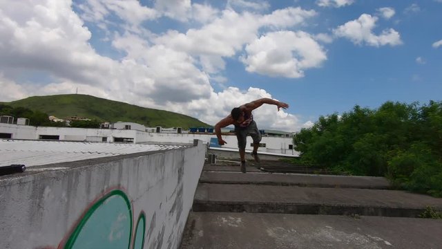 freerunner performs huge sidebackflip from a wall