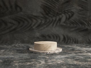 White errazzo podium with shadow of tropical palm leaves. Cosmetic background for product presentation showcase. fashion magazine illustration. 3d rendering - illustration.