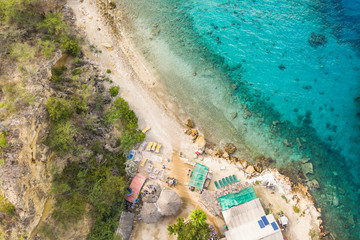 Aerial view of coast of Curaçao in the Caribbean Sea with turquoise water, cliff, beach and...