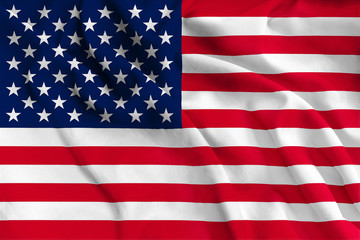 Obraz premium Red and white striped and blue with white stars American flag waving in the wind, close up. US national flag is a symbol of freedom and democracy. American country background.