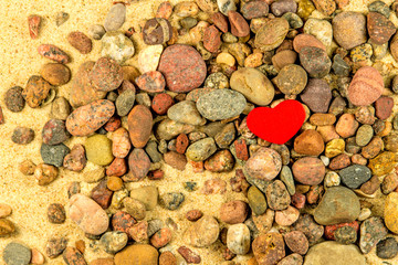 heart on a beach with stones
