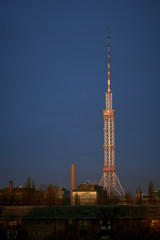 Fototapeta na wymiar Kiev TV tower against a blue sky