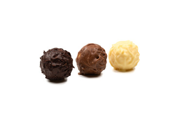Chocolate truffle isolated on white background.
