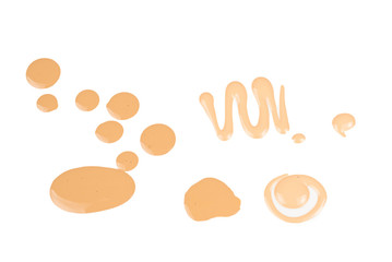 Liquid foundation swatch isolated on white background. Close Up of makeup cream sample.
