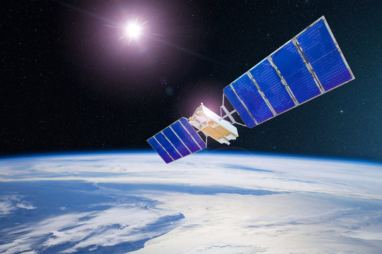 Space satellite orbiting the earth. Elements of this image furnished by NASA