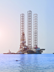 Drilling rig in oil field for drilled into subsurface in order to produced crude inside view, Petroleum industry Panorama vertical image and during maintenance