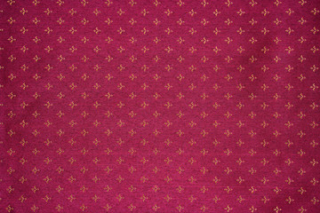 curtain cloth of claret color with a pattern. background, texture, wallpaper