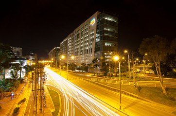 Fototapeta na wymiar Panoramic night building of the Bancolombia company, the largest bank in Colombia