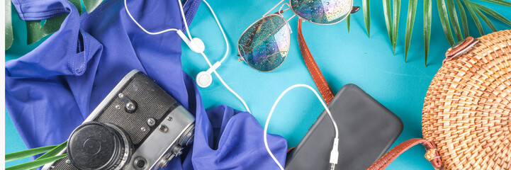 Summer vacation and travel concept. Beach accessories things - bag, hat, swimsuit, sunglasses,...