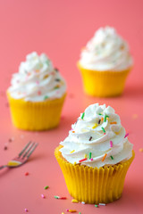 Homemade Birthday cupcake on pink Background.