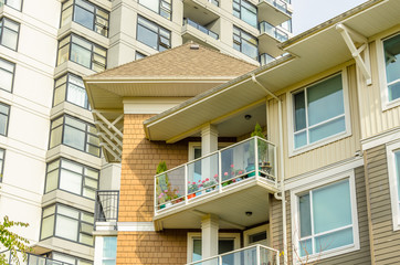 The top of the house or apartment building with nice window.