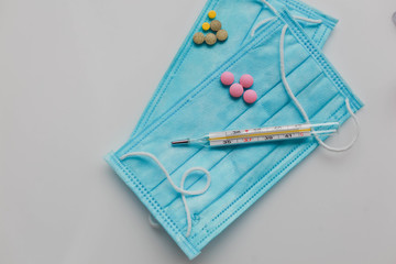 Coronavirus 2019-nCoV, MERS-Cov middle East respiratory syndrome. Wuhan pneumonia virus. Protective medical mask and medicines, pills against the virus.