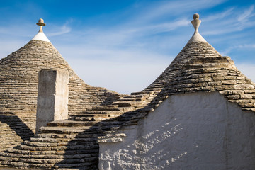 Fototapeta na wymiar Beautiful view of Trulli houses roof in Alberobello, Italy