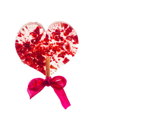 redl heart shaped lollipop isolated on a white background