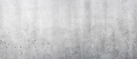 Fototapeta na wymiar Beschaffenheit einer alten grauen Mauer aus Beton als abstrakter Hintergrund