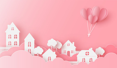 Views of the house in love with heart balloon flying on the pink sky