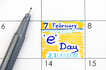 Reminder E Day in calendar with pen. E Day is celebrated on February 7th