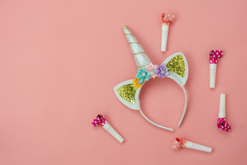 Table top view aerial image of beautiful colorful carnival festival background.Flat lay accessory object the decor for party seasonal on modern pink paper at home office desk studio.copy space.