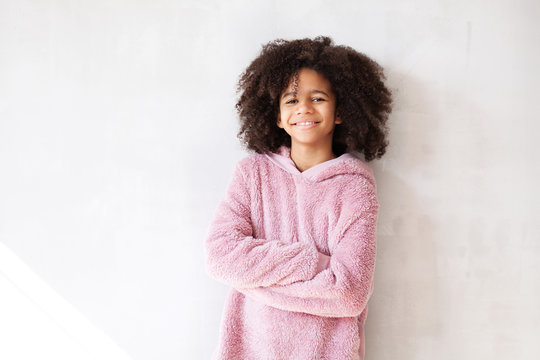 Сute girl in soft cosy hoodie