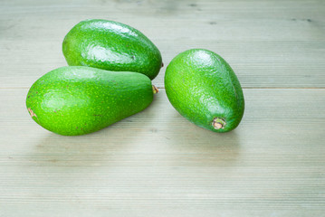 avocadoes on wooden table