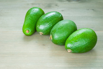 avocadoes on wooden table