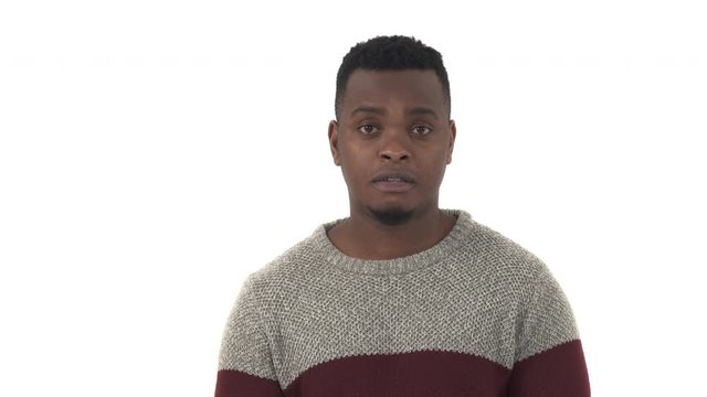 Close-up portrait of a man expressing regret emotion. Millennial man biting himself into forehead, Isolated, on white background. Human emotions, body language, life perception.