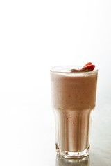 Strawberry smoothie drink in glass 