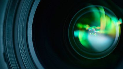 Macro photography of a DSLR lens with a colorful glare
