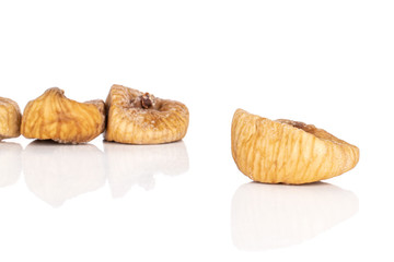 Group of four whole dried fig one separated isolated on white background