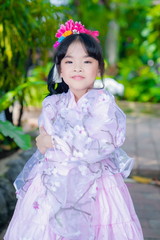 asian little girl Wearing yukata in graden