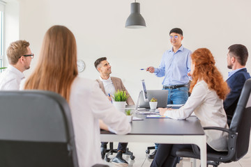 Group of business people during meeting in office