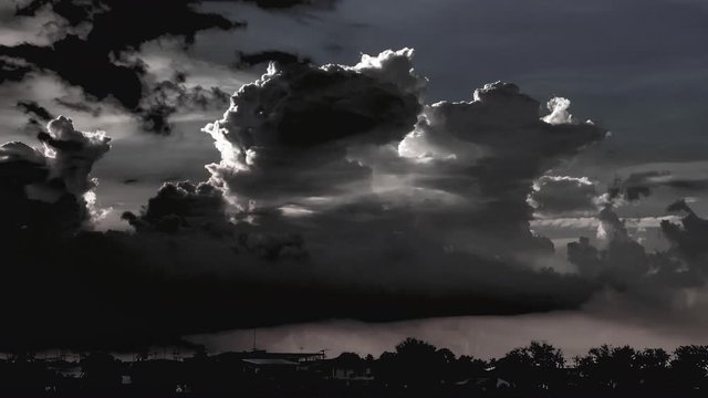 Timelapse photo rain clouds and black clouds , Form rain in the evening Thailand