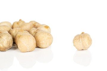 Lot of whole fresh tan chickpea isolated on white background
