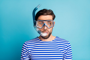 Photo of funky emotional handsome guy tourist diving underwater mask see colorful fish corals...