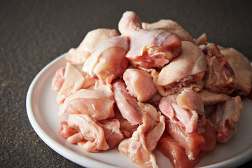 Fresh raw chicken legs on plate