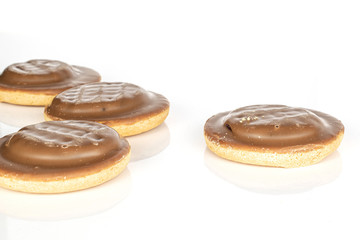 Group of four whole chocolate biscuit isolated on white background