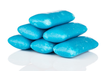 Group of six whole blue chewing gum stack isolated on white background