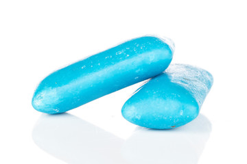 Group of two whole blue chewing gum isolated on white background