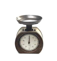 old kitchen scale on a white background
