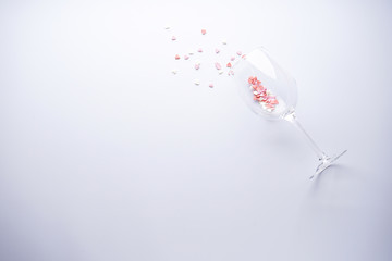 Sweet hearts in a glass on a white background, with space for text. Valentine's Day. Love concept.