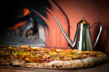 Pizza baking in traditional stone oven
