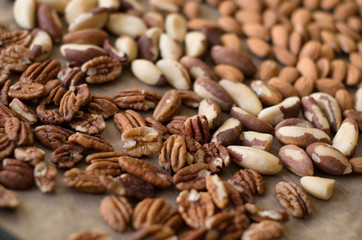 Background of mixed nuts - pecans, almonds, brasil nuts