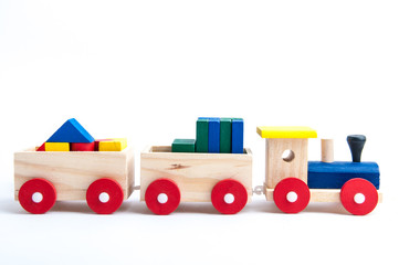 Wooden toy train isolated on white background