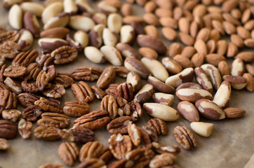 Background of mixed nuts - pecans, almonds, brasil nuts
