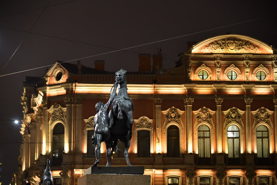 Russia, Saint Petersburg urban landscape in the night.  Horse Tamer sculpture