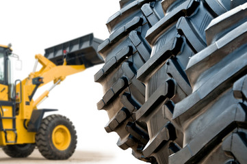 Stack of brand new tractor and loader tires