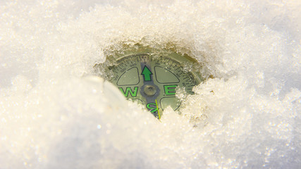compass buried in the snow