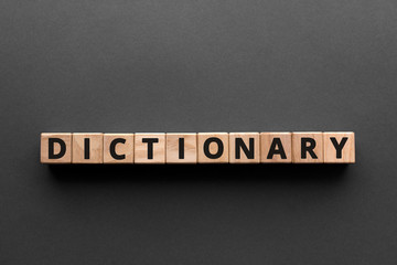 Dictionary - words from wooden blocks with letters, glossary  vocabulary dictionary concept, top...