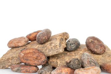 Fototapeta na wymiar Lot of whole fresh brown cocoa bean with cocoa butter isolated on white background